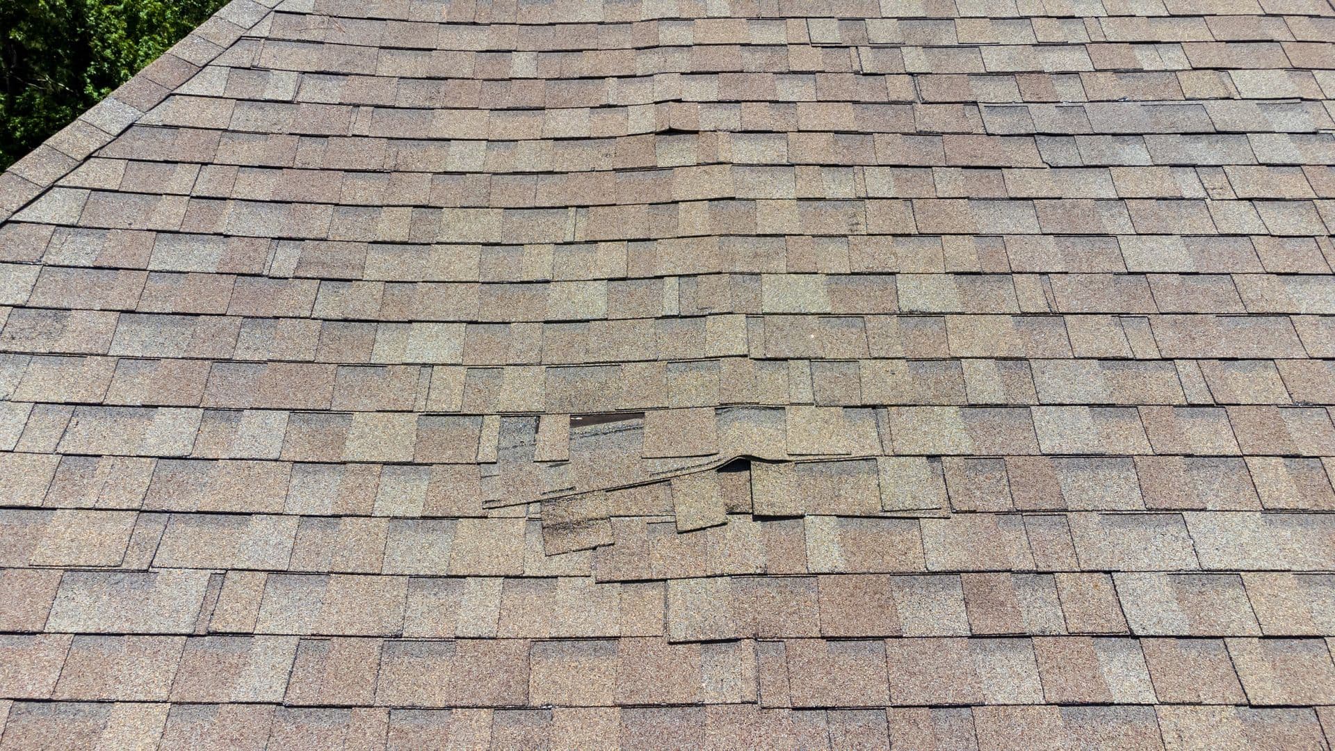 A close up of a roof with a hole in it